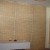 Бамбукова рогозка на стената